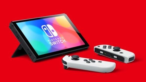 קונסולת משחק Nintendo Switch OLED 64GB - צבע שחור / לבן - שנתיים אחריות ע''י היבואן הרשמי